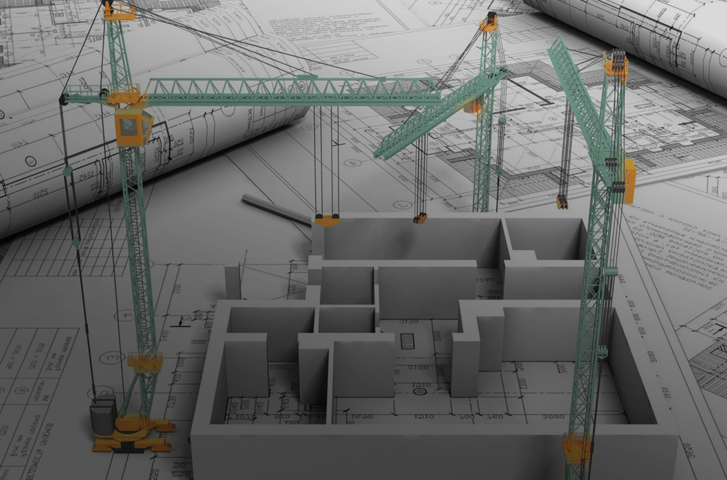 Blueprint with cranes and structural architecture model on top of it