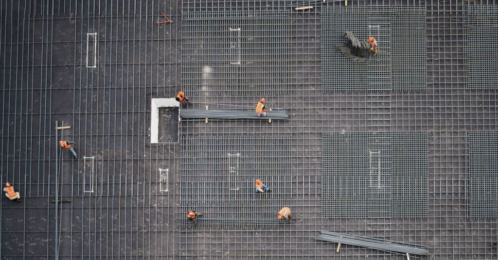 Construction workers rebar tying